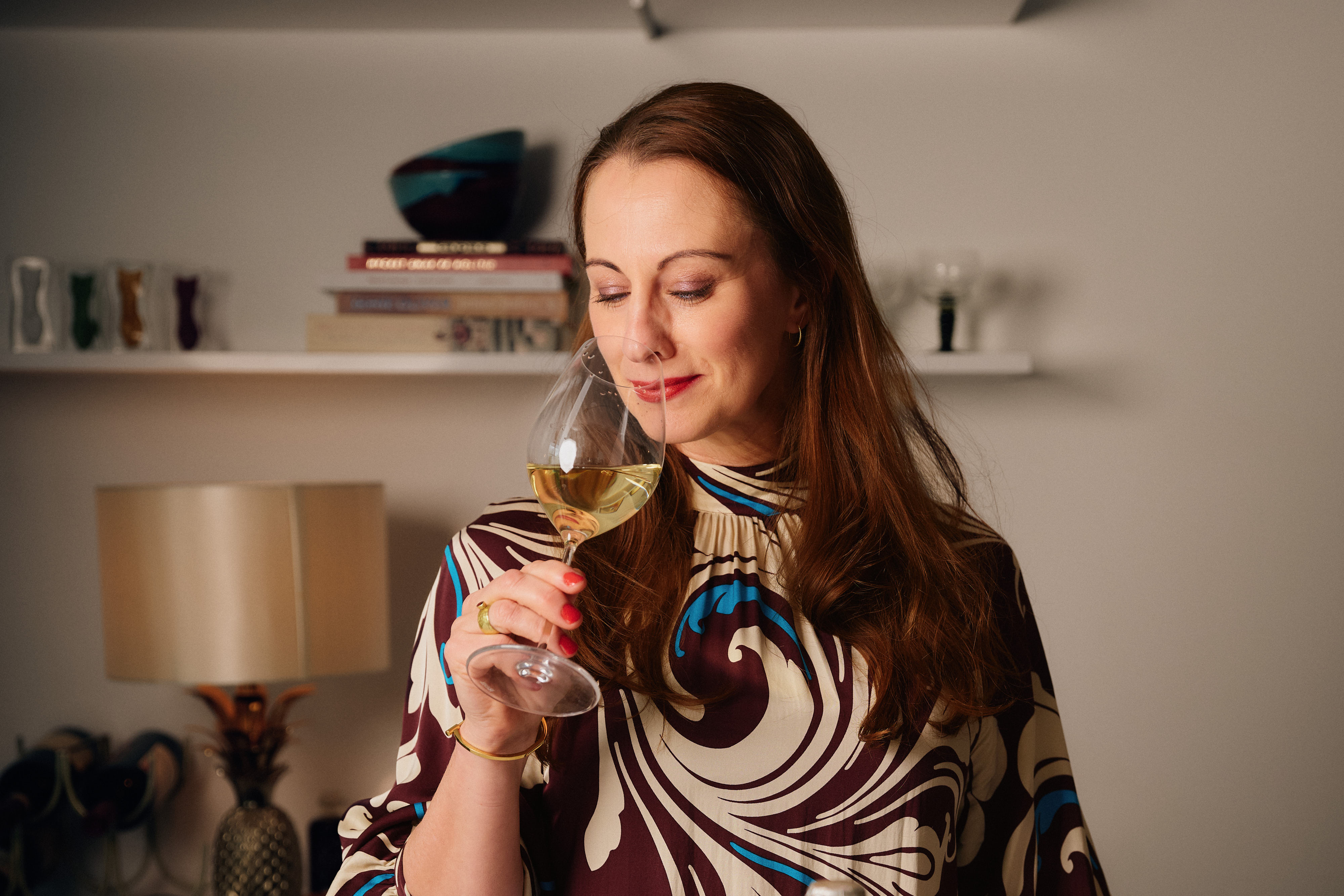 Camilla Sand nosing a wine